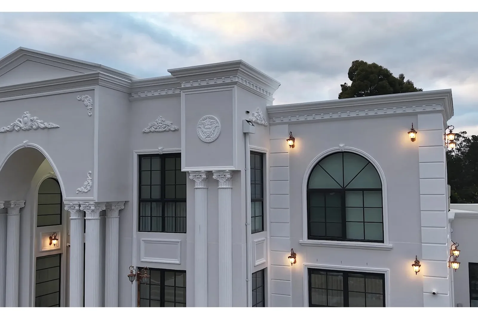 Street facade of a completed Lotus custom home.